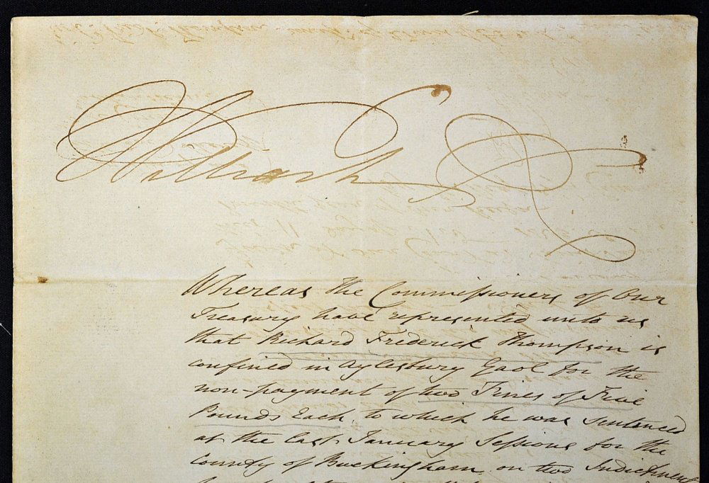 King William IV 1765-837 signed warrant: King William IV 1765-837 signed warrant hand written in script relating to Richard Frederick Thompson who was 'confined to Aylesbury Prison Buckingham^ for the non-payment of two fines of five pounds