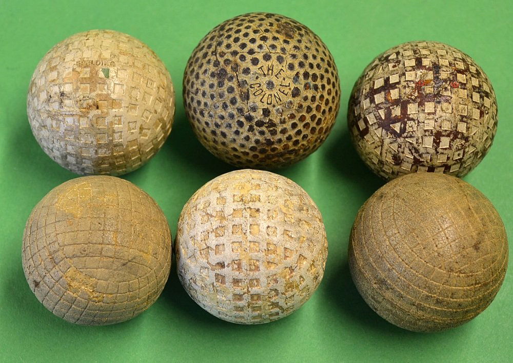 4x various golf balls to incl The Colonel bra: 4x various golf balls to incl The Colonel bramble pattern guttie golf ball, 2x square mesh including a Spalding Kro Flite plus 2 rubber square line pattern practice balls
