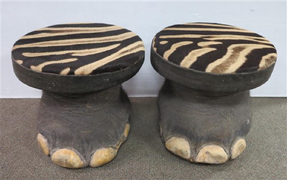 Elephant stools with zebra seats: Elephant stools with zebra seats