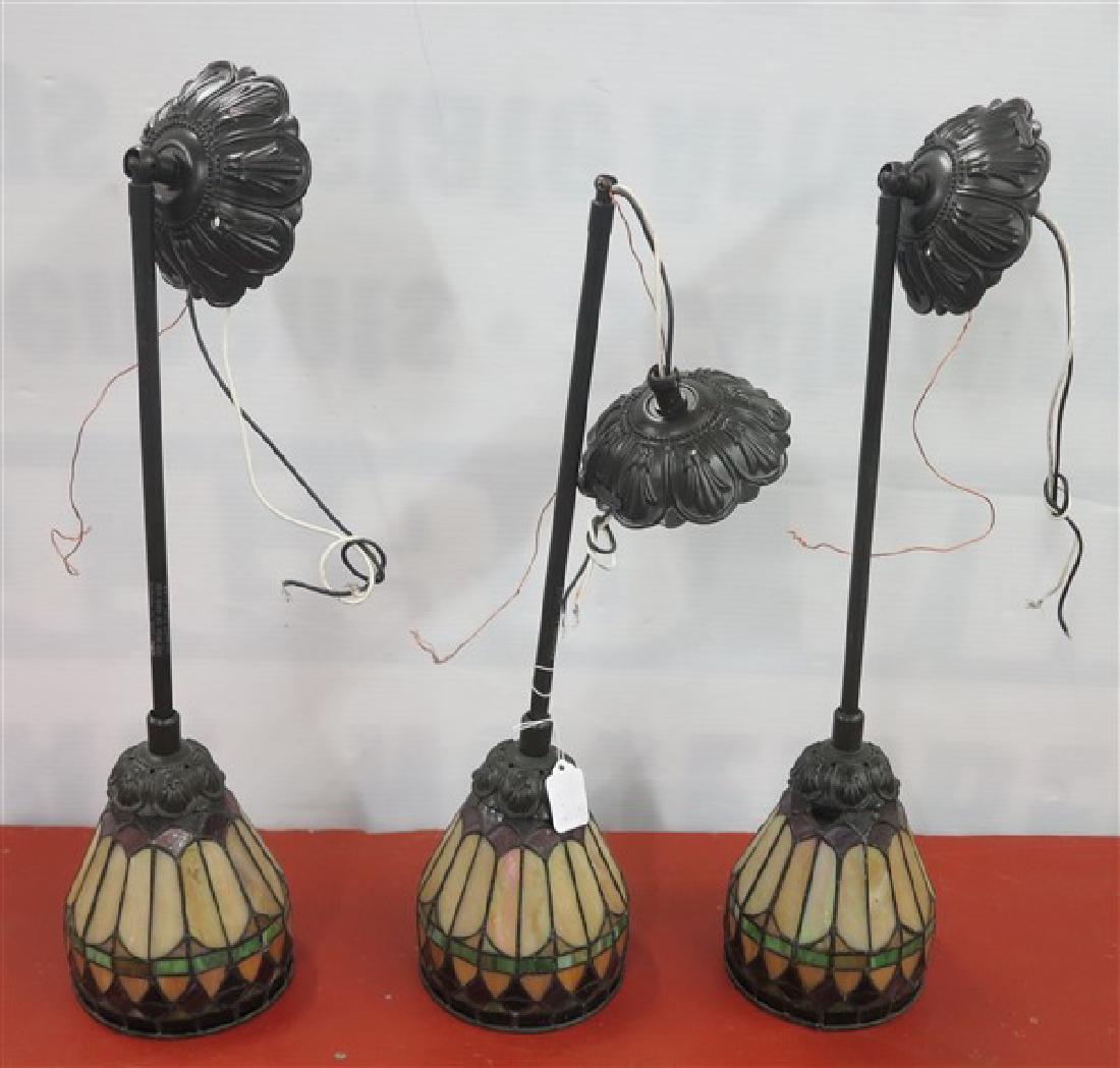 3 hanging leaded glass fixtures: 3 hanging leaded glass fixtures- Including the hanging stem 21" to ceiling plate- 5.75" diameter globe- very nice condition.