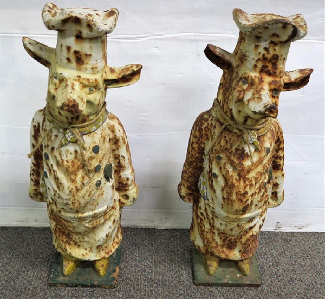 Pair 23 1/2 " cast iron pigs (1 of 1)