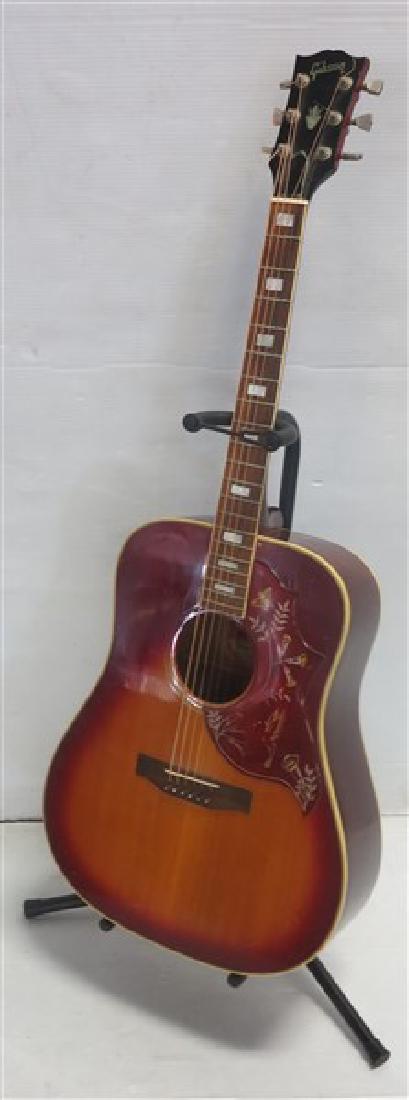 Gibson "Hummingbird" acoustic guitar Serial# B301727 (1 of 3)