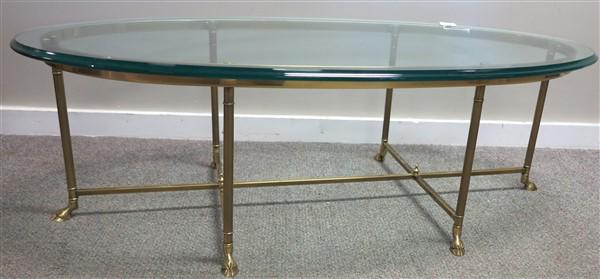 Brass and glass oval coffee table: Brass and glass oval coffee table