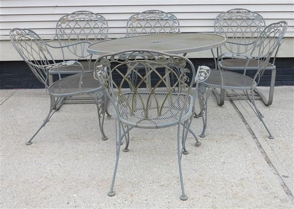 Iron and mesh 7 piece table and chairs: Iron and mesh 7 piece table and chairs TABLE : 41.5" X 28.5"H- One leg is slightly bent but is repairable. There are no broken welds.