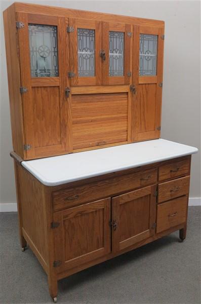 Oak hoosier cabinet- 48"w x 69.5" x 27.5"d: Oak hoosier cabinet- has sifter, tambour still rolls goodbase- 32"h x 48"w x 27.5"dtop- 37.5"h x 46"w x 12"d