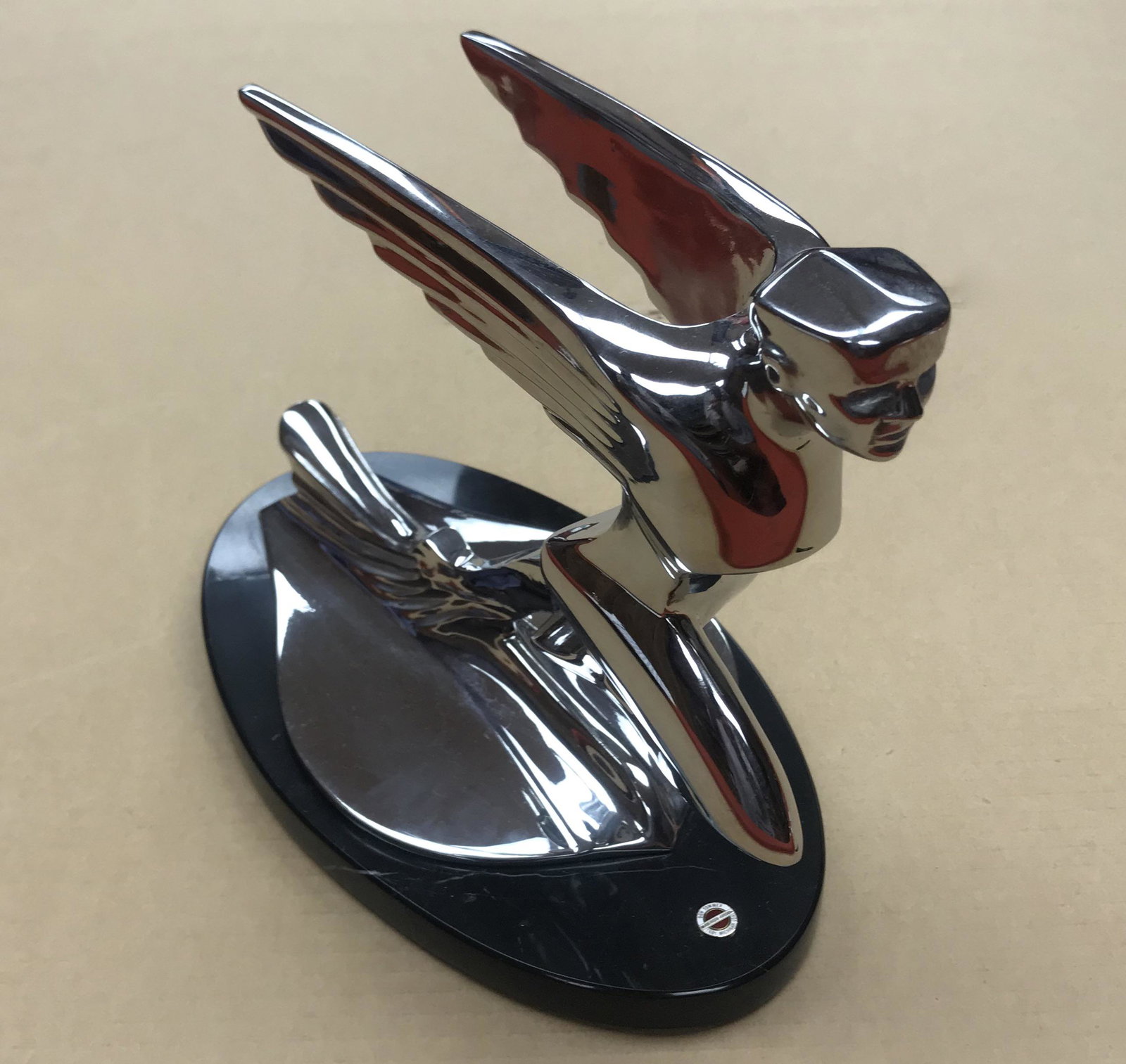 1934 Auburn winged man- by Don Sommer: 1934 Auburn winged man