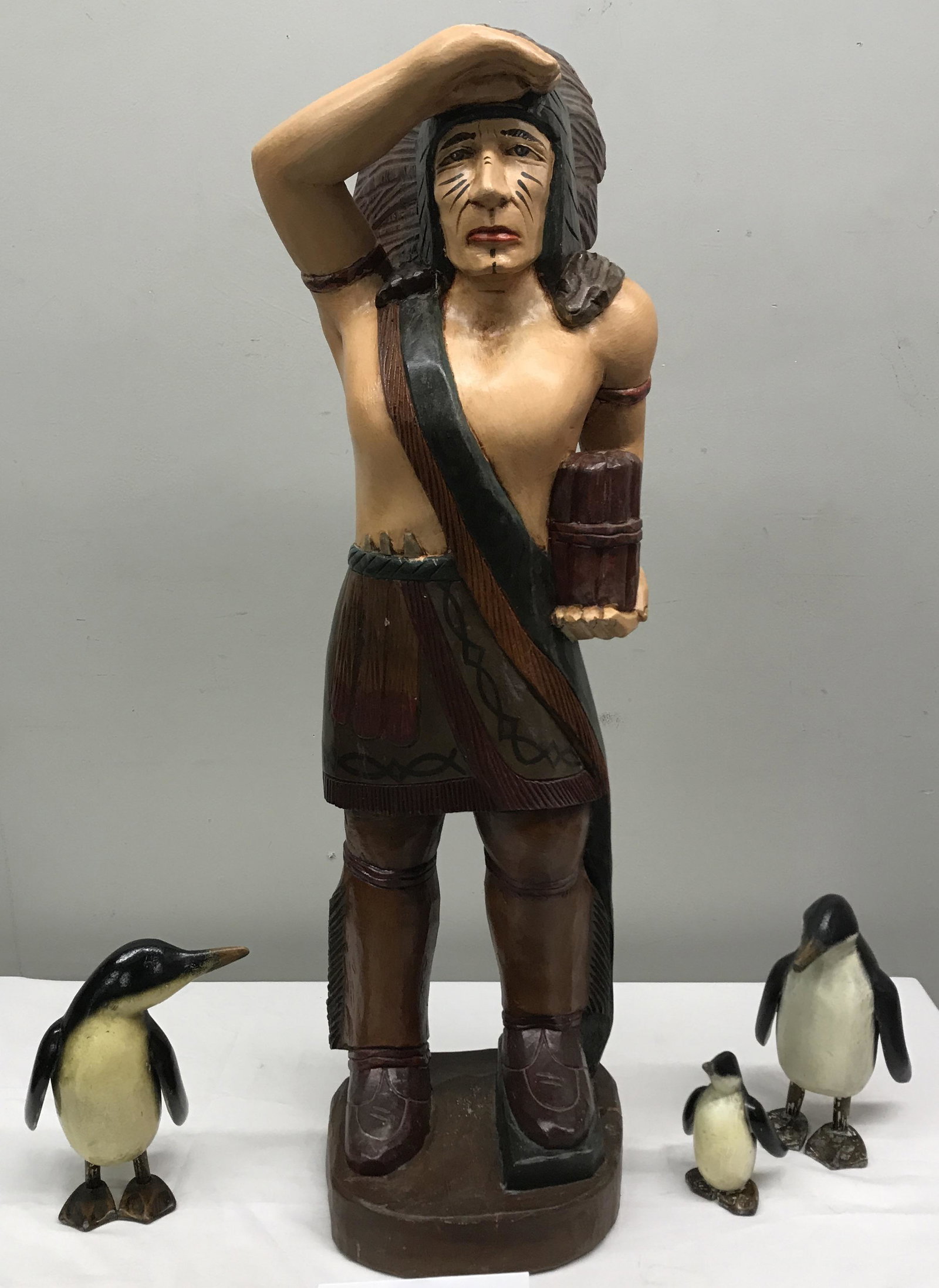 37" carved wooden Indian & 3 Penguins: 37" carved wooden Indian & 3 Penguins