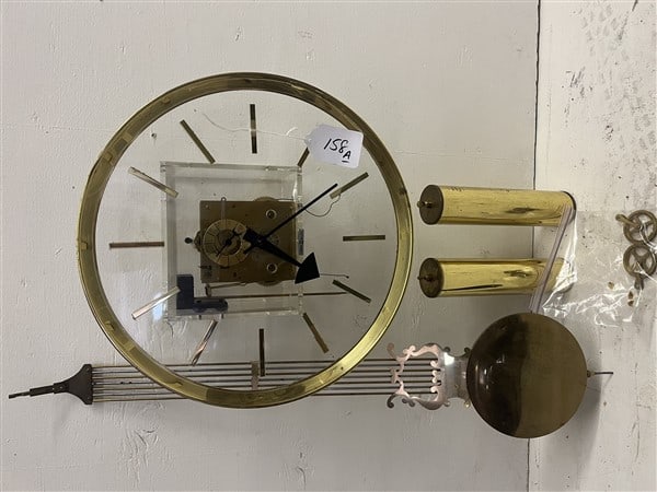 Lucite and Brass Howard Miller Clock: Lucite and Brass Howard Miller Clock