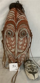 2 Early Caved and Painted Wooden Masks