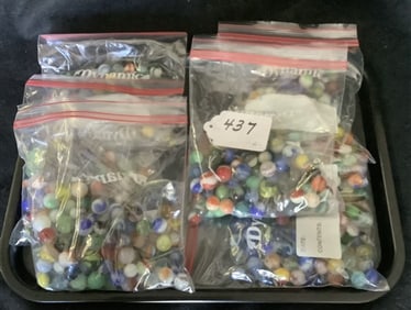 6 Bags of Marbles