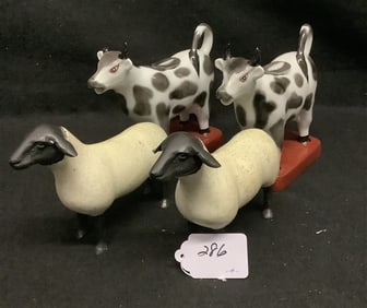 4 Porcelain Cows