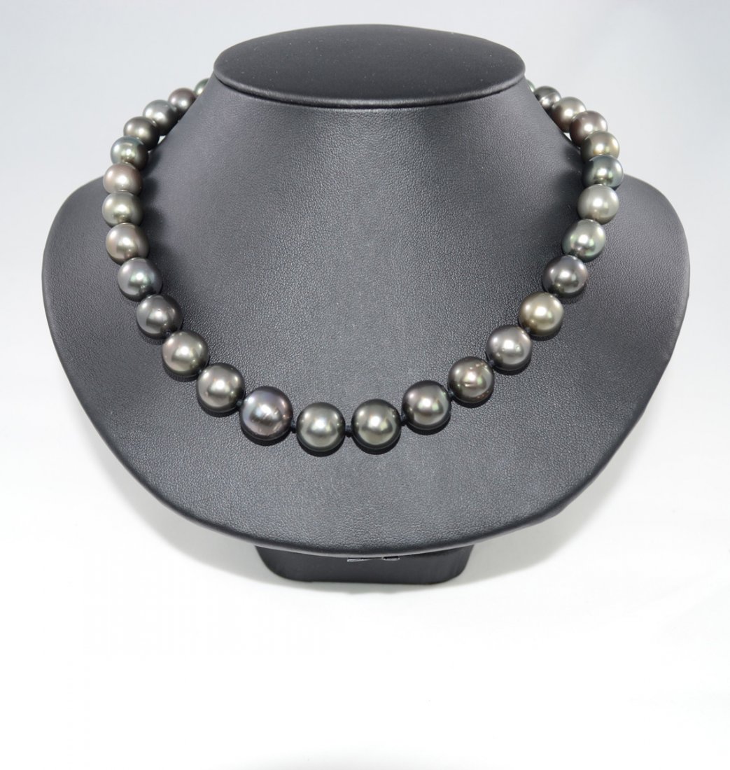 Tahitian Cultured Pearl Necklace. Contains 35 Cultured: 10.5mm and 13.5mm in size. Estimated Retail Value: $14,000. See Gemologist Report for more information.