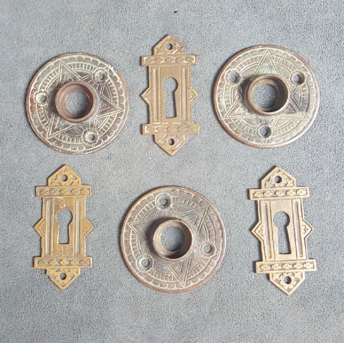 Corbin Rosettes & Keyhole Escutcheons: More good Corbin hardware in the compass rose design. Three large rosettes, 2.25” diameter and three open keyhole escutcheons, 2.75” x 1.25”. All as found and in very good condition.