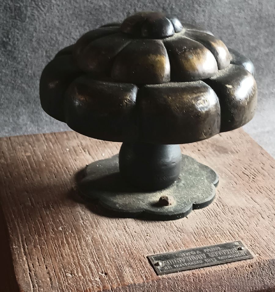 Arcularius: George Arcularius of NYC designed this over-size center door pull, likely in the mid-20th C….heavy cast bronze and very nice as found