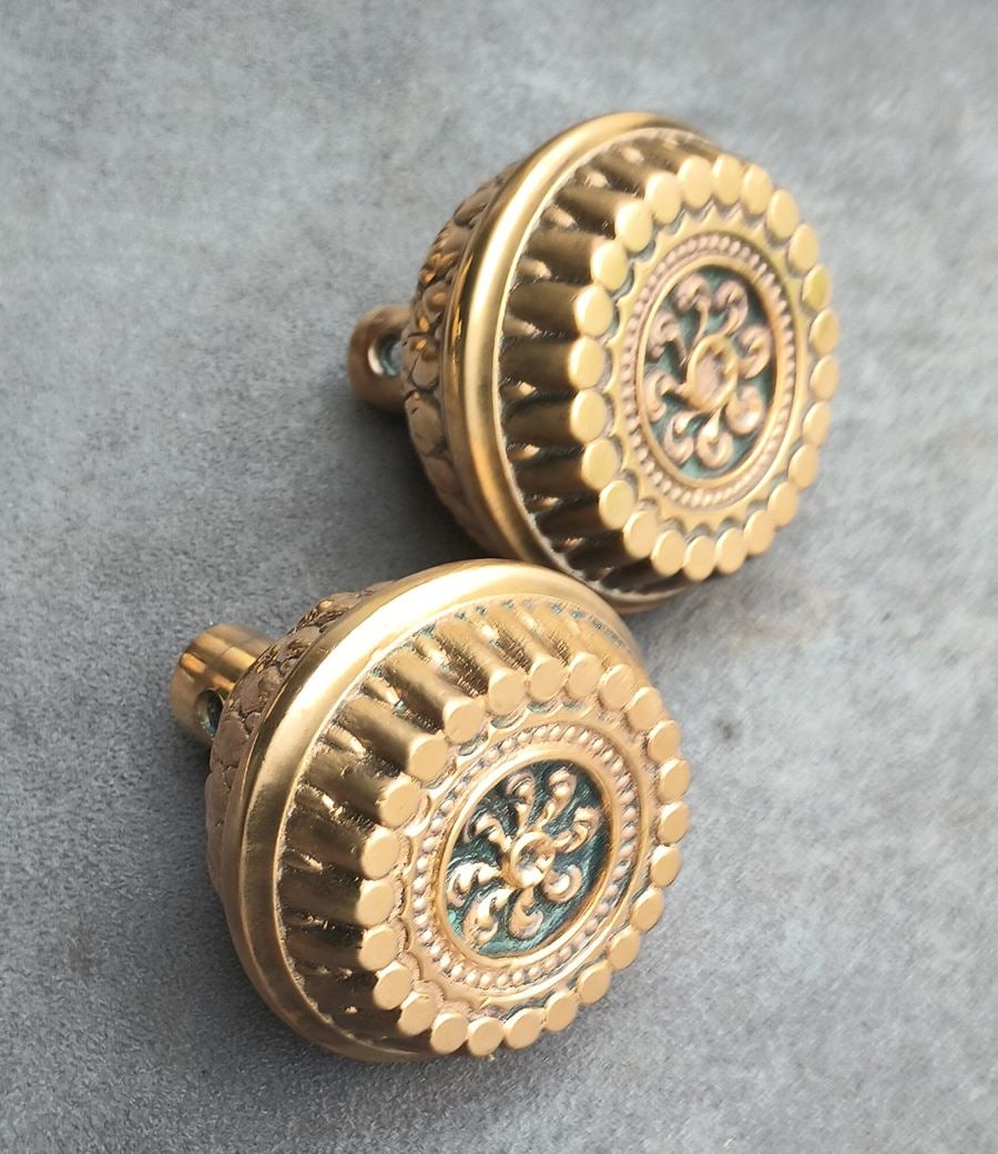 Corinthian Design: Entry and passage knob in the Corinthian design from Yale c. 1890s...Branford offered similar...appear to anticipate the invention of the machine gun...both good as fond