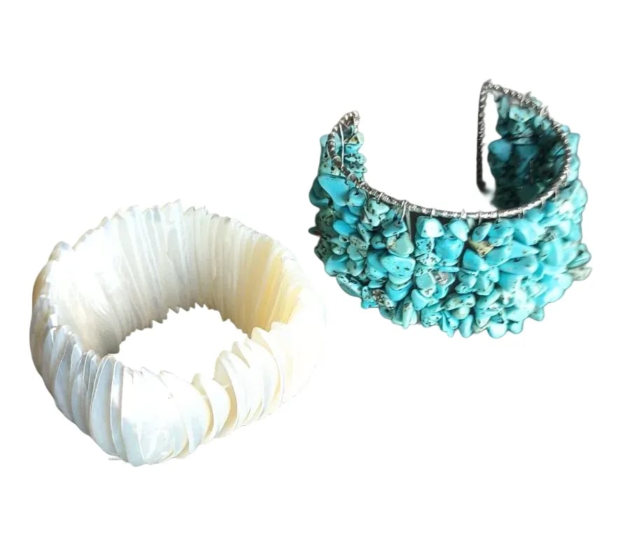 Two Vintage Cuff Bracelets: Two fun cuff bracelets, one of turquoise beads on wire frame being 1.5" wide and the second being Mother-of-Pearl discs on elastic lines being approximately 1.5" wide and both in very good condition.