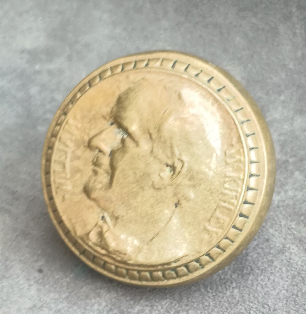 William McKinley, President: Brass entry knob from a St. Louis high school c. 1902 named after President Wm. McKinley who was assassinated in 1901 at the Pan American Exhibition but who had been making plans for a Louisiana Purch