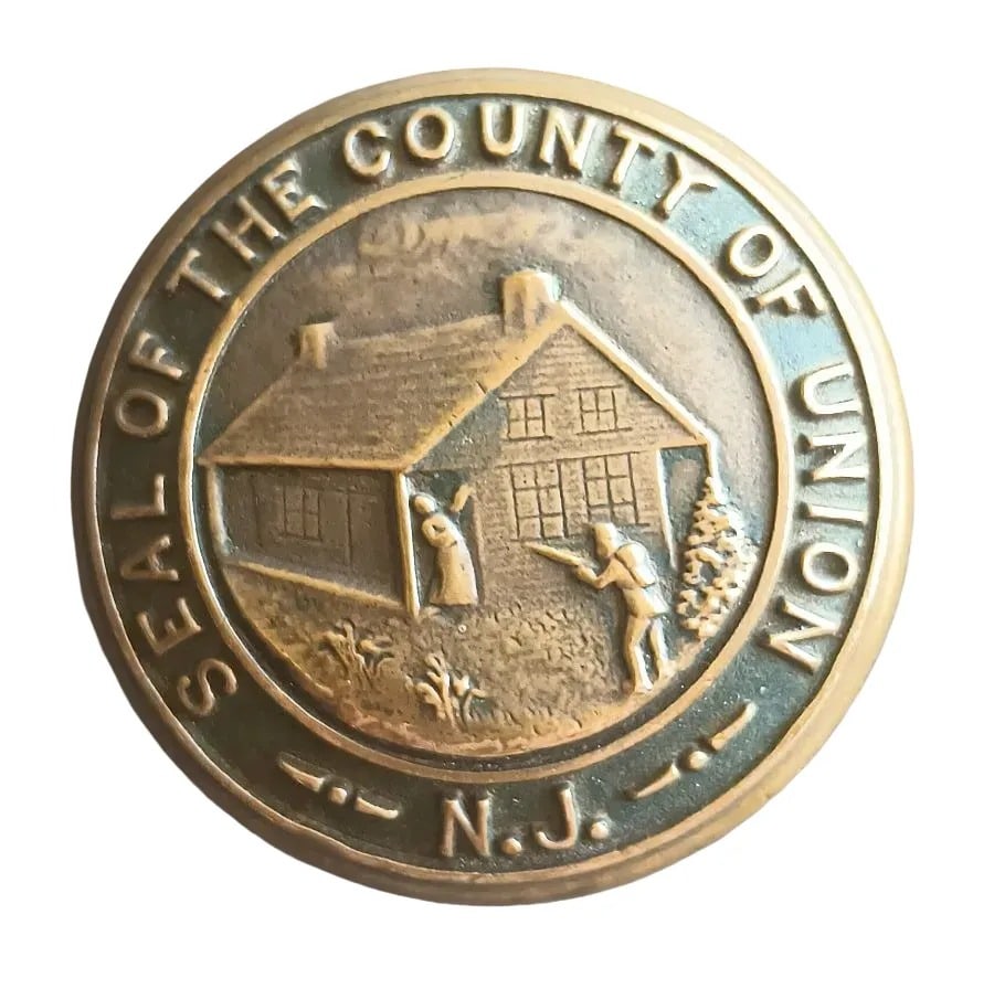 The Great Union Country Murder: Seal of Union County, NJ showing an incident from the Revolutionary war where the wife of clergyman was killed during a skirmish with the British…look up the actual story and compare it to this