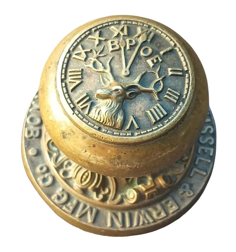 BPOE Paperweight: Cast bronze promotional paperweight with a passage knob featuring an Elk's club design and touting ball bearing knobs from Russell & Erwin...several similar paperweights are extant from various manufa