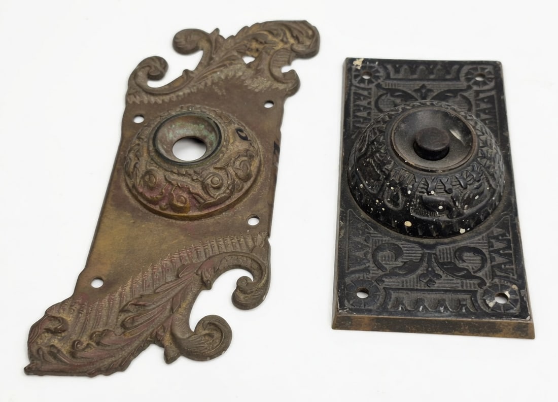 Two Doorbell Plates: Two cast bronze doorbell plates both c. 1890s...largest is 7" x 3.75"...one with the original button and wiring...nic as found...