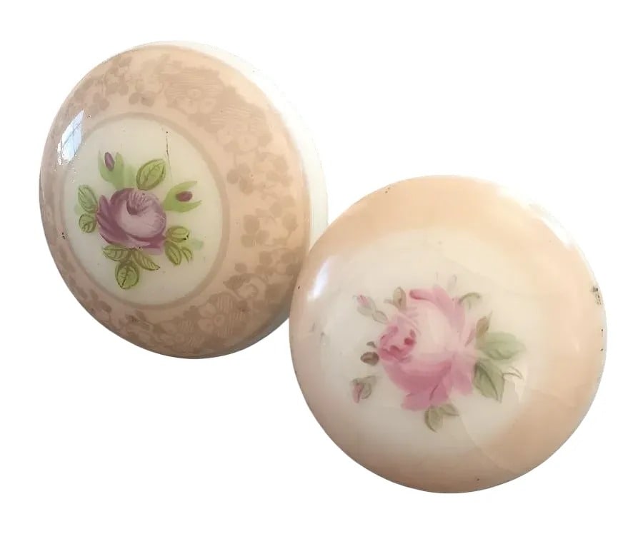 Early Decorated Porcelain: Two porcelain knobs, one passage, one entry size, with hand painted and stenciled decorarion...these date to the 1860s and represent some of the earliest efforts at making builders' hardware an