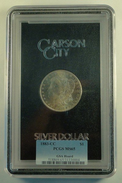 1883 CC GSA Morgan Dollar.  PCGS Certified MS65. (1 of 4)