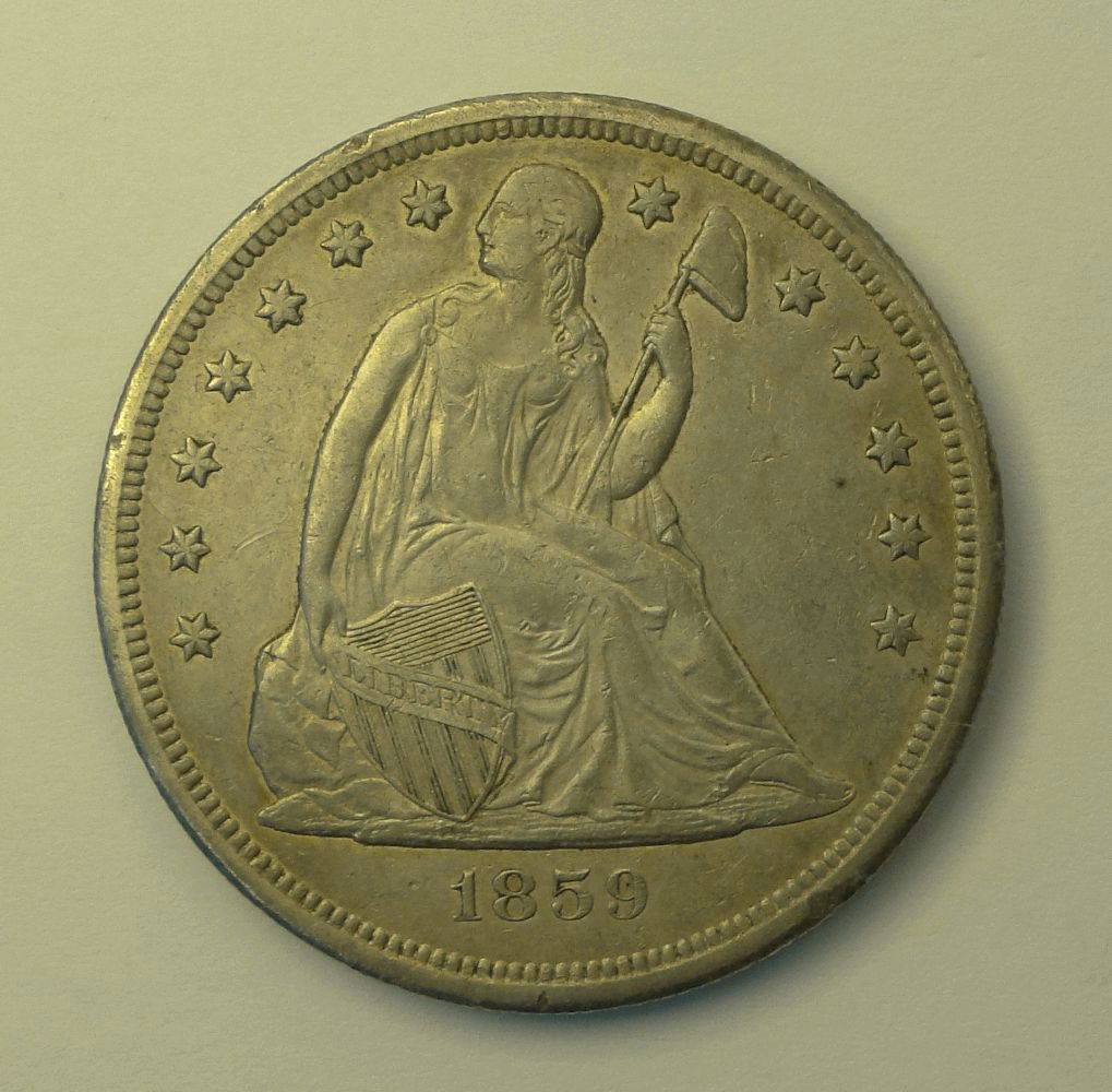 1859 O Seated Liberty Dollar. (1 of 2)