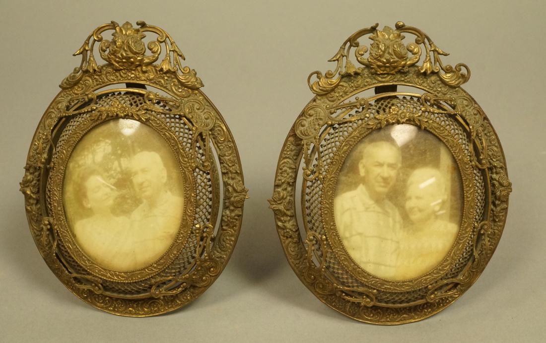 Pr Antique Delicate metal oval picture frames. Ma: Pr Antique Delicate metal oval picture frames. Marked Germany. Fancy filigree and scroll elements. -- Dimensions: H: 4.5 inches: W: 3.5 inches --- US Shipping charge: $10