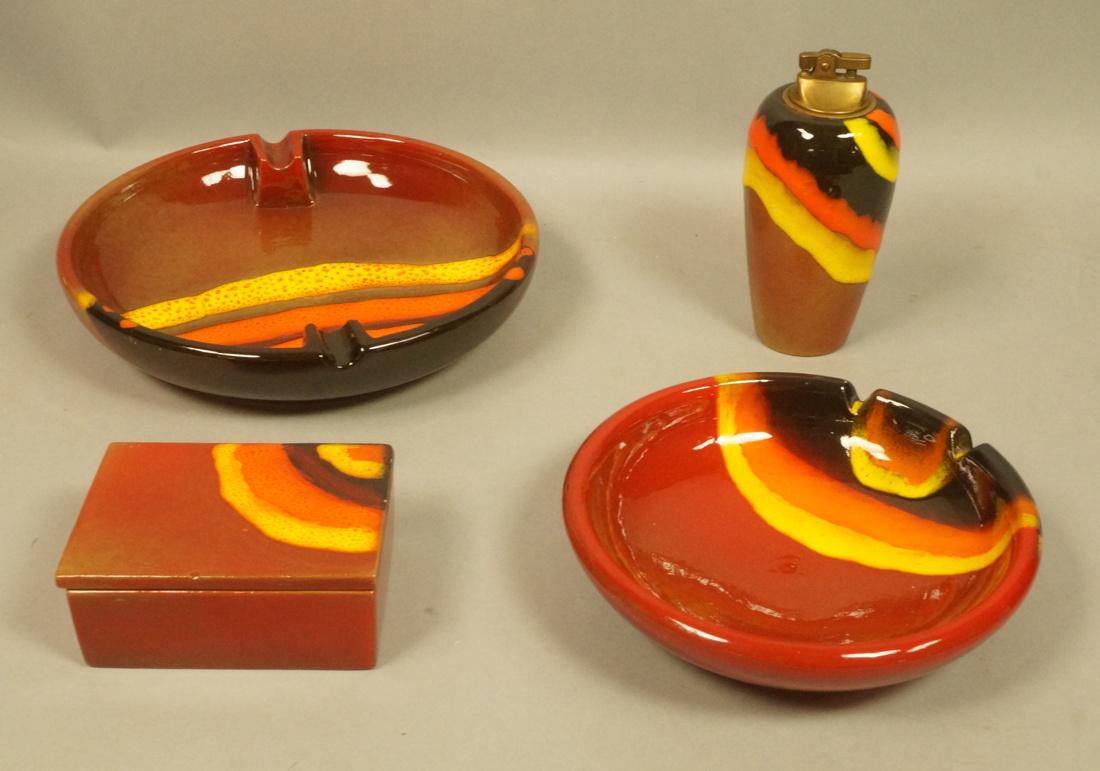 4pc RAYMOR Italian Pottery Tableware Smoking Set.: 4pc RAYMOR Italian Pottery Tableware Smoking Set. 2 round ashtrays, cigarette box and lighter. All with red yellow and orange glaze design. 3 pieces with paper label. -- Dimensions: H: 2.25 inches: W: