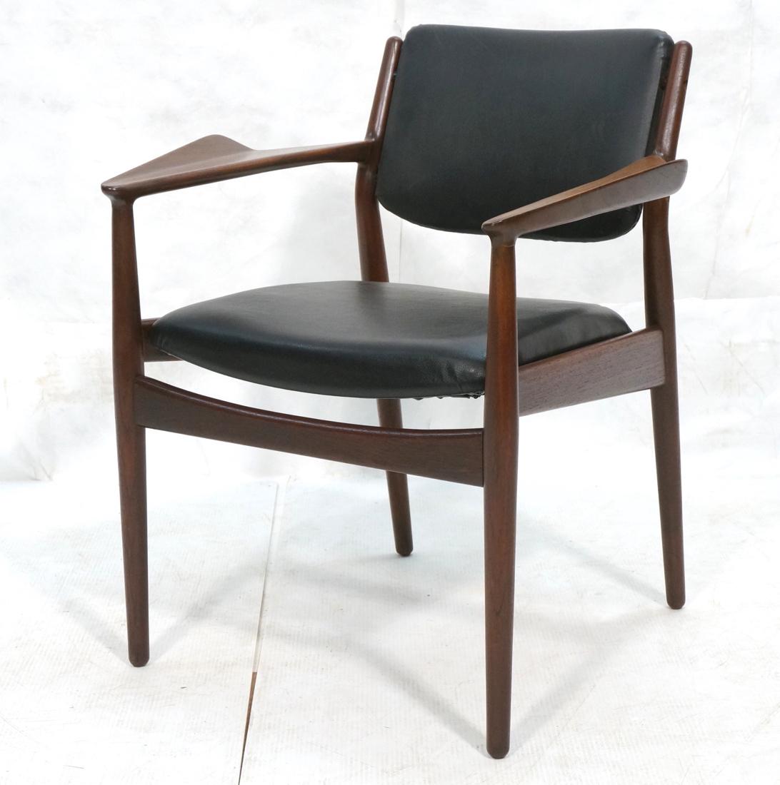 ARNE VODDER Danish Teak Modern Arm Side Chair. St: ARNE VODDER Danish Teak Modern Arm Side Chair. Stylish flared arms. Black vinyl seat and back rest. Marked GEORGE TENIER SELECTION. SIEBAST MOBLER. Made in Denmark-- Dimensions: H: 30.5 inches: W: 26.