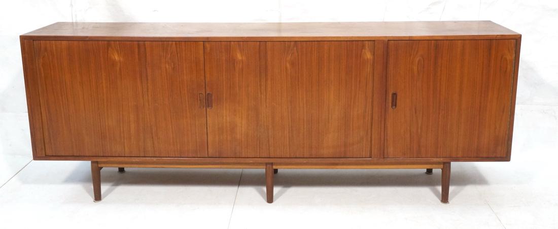 Arne Vodder Sibast Teak Tambour Door Credenza Sid: Arne Vodder Sibast Teak Tambour Door Credenza Sideboard. Two tambour doors with fitted interior, single swing out door. Cabinet raised on tapered peg legs.-- Dimensions: H: 32.75 inches: W: 88.25 inch
