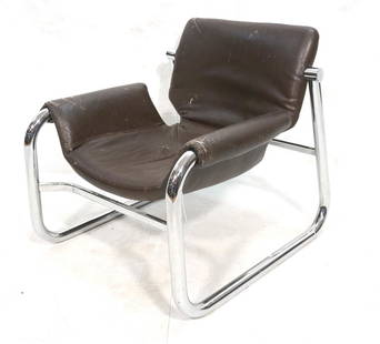 Brazilian Chrome Tube Leather Lounge Chair POZZA.: Brazilian Chrome Tube Leather Lounge Chair POZZA. Thick chrome tube frame with brown leather seat. Maurice Burke designer Label-- Dimensions: H: 27 inches: W: 26 inches: D: 27.5 inches ---