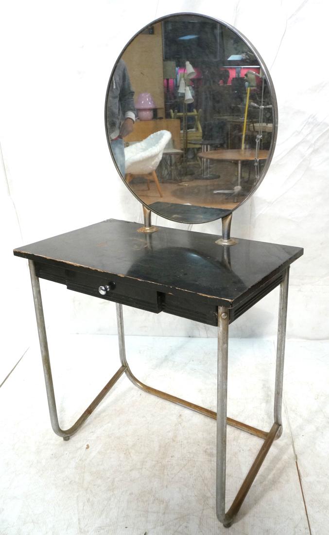 WOLFGANG HOFFMANN Attrib Art Deco Ebonized Vanity: WOLFGANG HOFFMANN Attrib Art Deco Ebonized Vanity. Chrome tube frame legs. Attached round mirror with feet. Single drawer. Hoffmann attribution.-- Dimensions: H: 55 inches: W: 30 inches: D: 18 inches