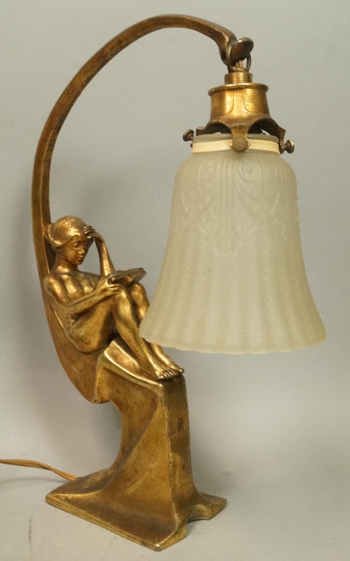 OSIRIS Art Deco Metal Figural Lamp. Nude woman re: OSIRIS Art Deco Metal Figural Lamp. Nude woman reading. Frosted glass shade. Marked OSIRIS 816-- Dimensions: H: 14.5 inches: W: 4.5 inches: D: 11 inches --- US Shipping charge: $50