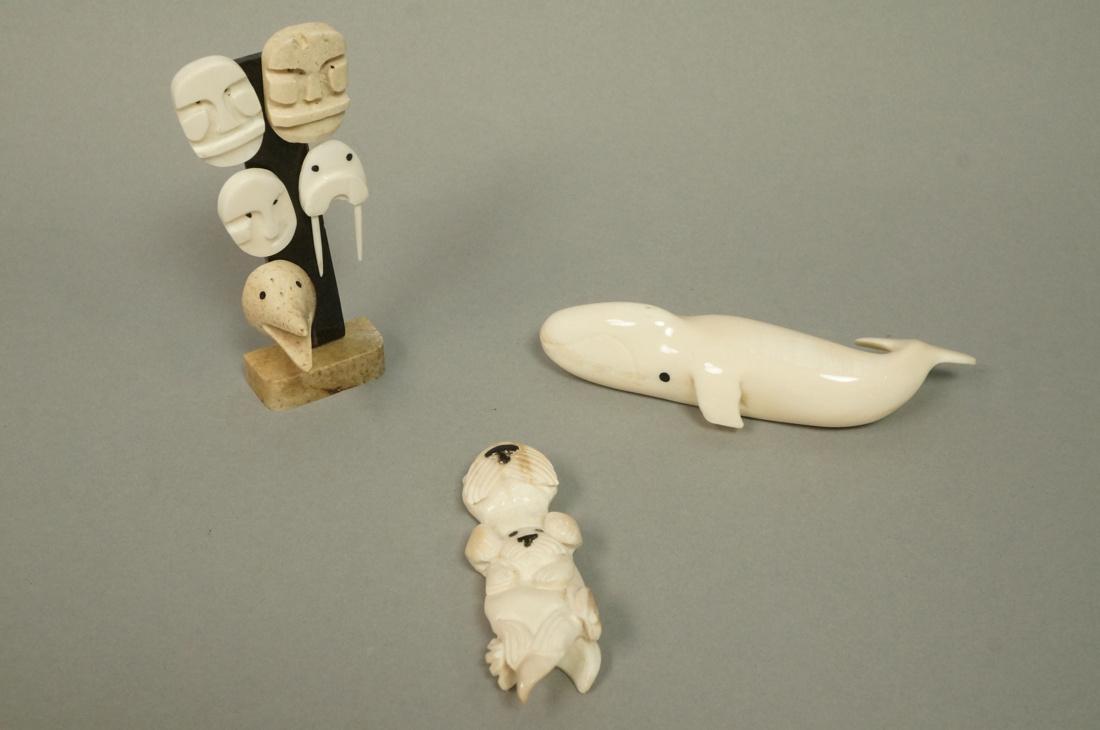 3 pc Carved Alaskan Figures. Carved whale signed: 3 pc Carved Alaskan Figures. Carved whale signed RUSSELL SELOOKS, Carved otter and baby signed JJB, Alaskan Totem 5 carved heads labeled.-- Dimensions: H: 4.5 inches: W: 2 inches: D: 1.75 inches --- U