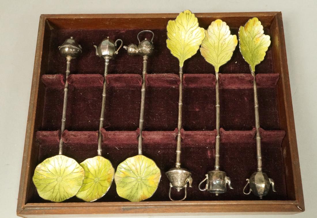 Set 6 Enameled Silver Leaf Design Spoons. Figural: Set 6 Enameled Silver Leaf Design Spoons. Figural green enamel lily pad or leaf bowls. Silver bamboo stems capped with different figural teapot tops. Not marked. In fitted lined box. -- Dimensions: H:
