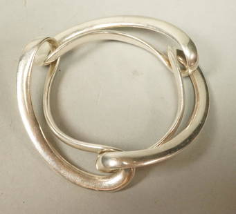 GEORG JENSEN Sterling Modernist INFINITY Bracelet.: GEORG JENSEN Sterling Silver Modernist INFINITY Bracelet. Three elongated open interlocking links. Marked #452. Denmark. Danish Modern. Designed by: Regitze Overgaard-- Dimensions: H: 2.25 inches: W: