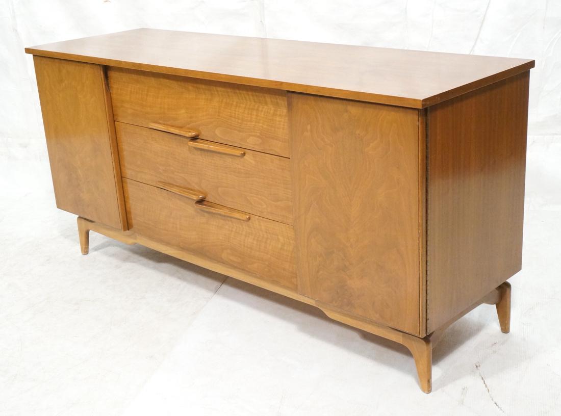 Modern Credenza Sideboard. 2 side doors. 4 center: Modern Credenza Sideboard. 2 side doors. 4 center drawer with opposing pulls. Tapered wood legs. Not marked.-- Dimensions: H: 31 inches: W: 64 inches: D: 20 inches ---