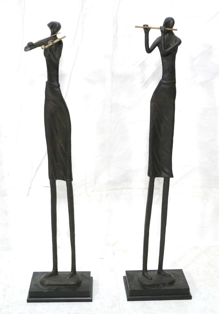Pr Tall Iron Figural Musician Sculptures. Tall se: Pr Tall Iron Figural Musician Sculptures. Tall semi nude females with violin and flute. -- Dimensions: H: 46 inches: W: 11.5 inches: D: 10.5 inches ---