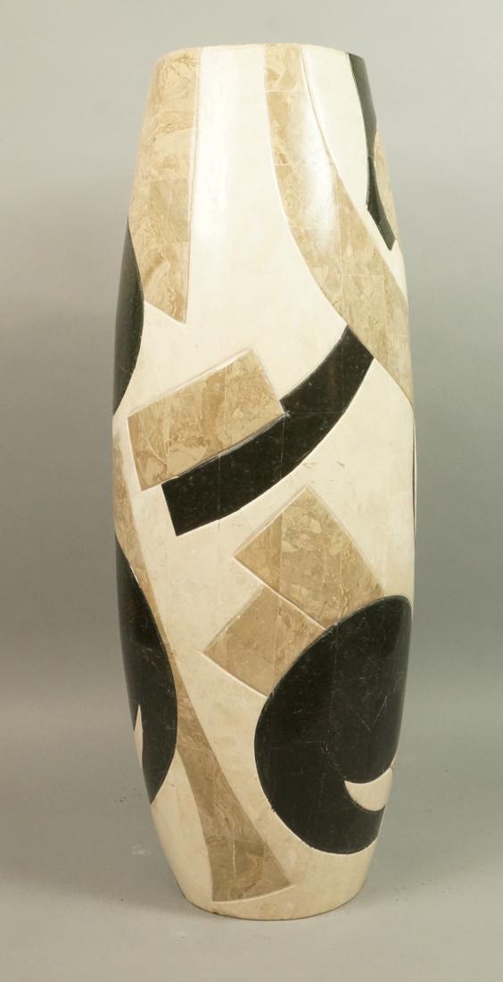 MARQUIS COLLECTION Travertine Mosaic Tall Vase. B: MARQUIS COLLECTION Travertine Mosaic Tall Vase. Beige body with black & tan pieced inlaid tiles. Label on base-- Dimensions: H: 30.5 inches: W: 10.5 inches: D: 10.5 inches ---