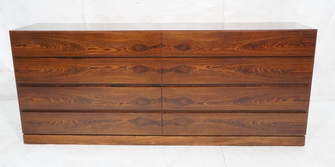 8 Drawer Rosewood Credenza Dresser. Simple Modern: 8 Drawer Rosewood Credenza Dresser. Simple Modernist form with rosewood skirted base. Not marked-- Dimensions: H: 29.5 inches: W: 72 inches: D: 18 inches ---