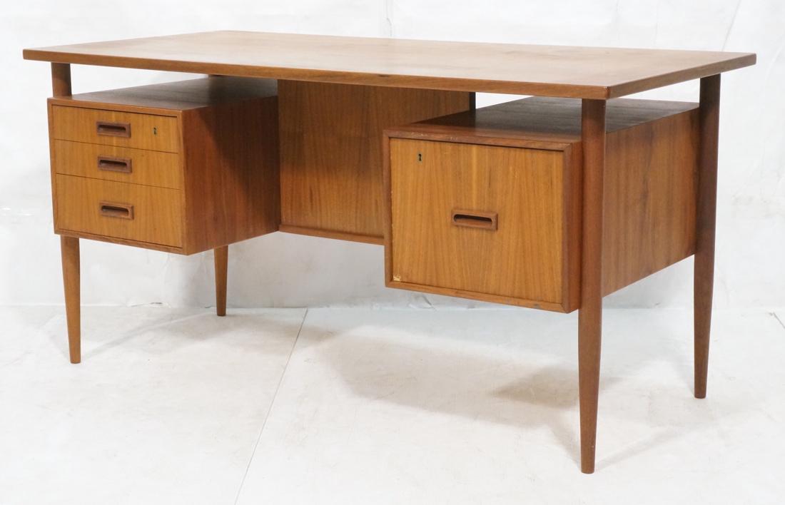 Danish Modern Teak Desk. Four Drawer. Floating to (1 of 9)