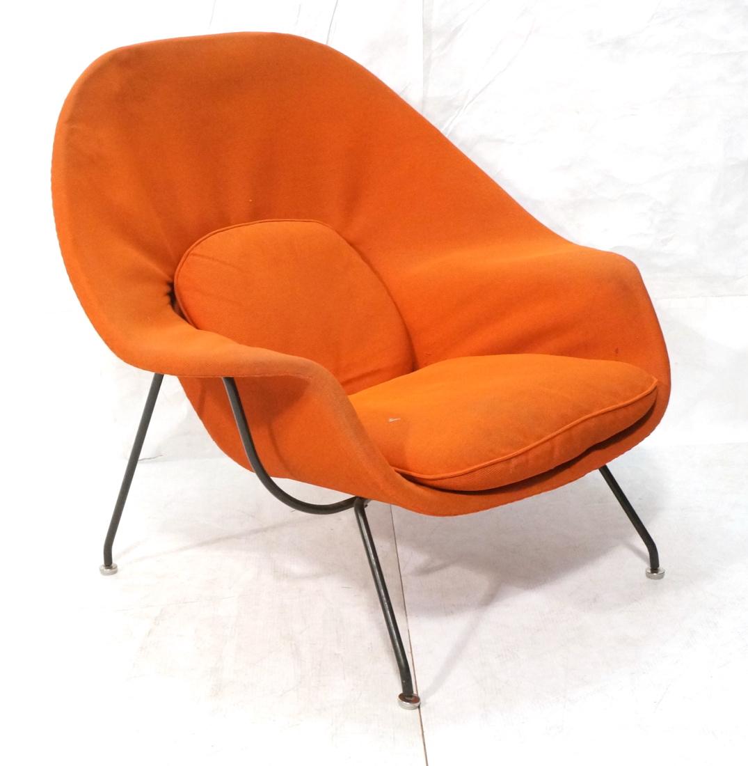 KNOLL Assoc Orange Womb Lounge Chair. Thin black: KNOLL Assoc Orange Womb Lounge Chair. Thin black iron frame. Marked KNOLL ASSOC. -- Dimensions: H: 35.5 inches: W: 36 inches: D: 32 inches ---