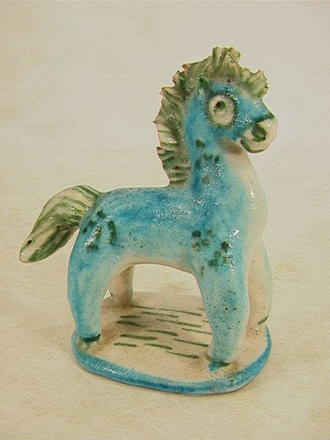 GAMBONE Signed Pottery Figural Horse ITALY. Express: GAMBONE Signed Pottery Figural Horse ITALY. Expressive Horse Figure. Rich Turquoise and green glaze. Overall crackle. Signed on base. Original RAYMOR Paper Label. Dimensions: H: 7 inches: W: 5.5 inche