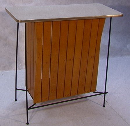 RAYMOR PAUL MCCOBB Slat and Iron Bar. Formica top.: RAYMOR PAUL MCCOBB Slat and Iron Bar. Formica top. Angled iron base with corseted slats. Unmarked Dimensions: H: 40.5 inches: W: 41.5 inches: D: 21 inches Condition: Excellent with one glass ring stai