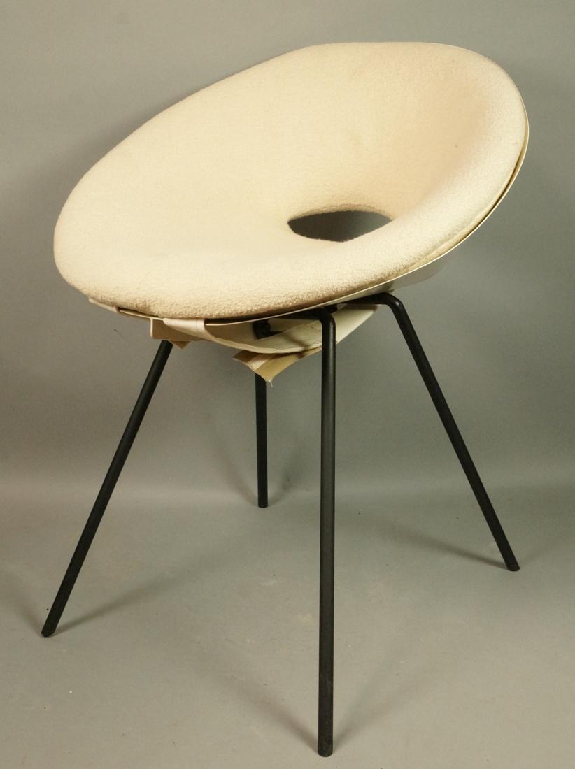 DONALD KNORR Steel Chair. One piece steel form se: DONALD KNORR Steel Chair. One piece steel form seat and back on black steel legs. Professionally restored with cushion made to original specifications. -- Dimensions: H: 28.25 inches: W: 22.5 inches: 