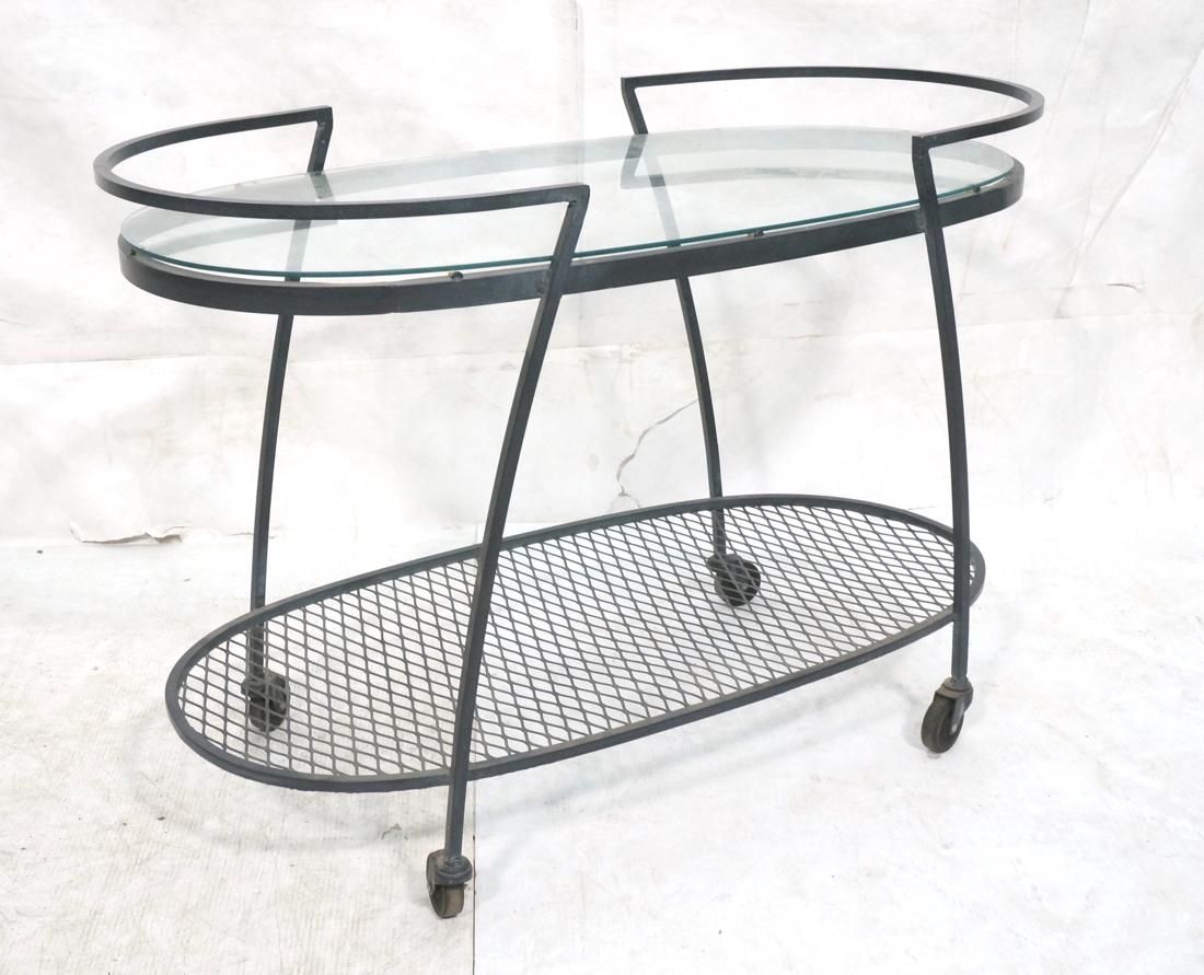 SALTERINI Iron & Glass Rolling Outdoor Bar Cart.: SALTERINI Iron & Glass Rolling Outdoor Bar Cart. Oval glass top. Mesh lower shelf. Raised on wheels. Not marked.-- Dimensions: H: 28 inches: W: 40.25 inches: D: 20 inches ---