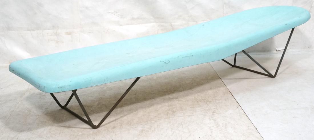 FIBRELA Aqua Slide Dive Corp. Chaise Lounge. Mold: FIBRELA Aqua Slide Dive Corp. Chaise Lounge. Molded fiberglass turquoise top on black hairpin iron triangular base. Marked. Made in California-- Dimensions: H: 16 inches: W: 23 inches: D: 78 inches --