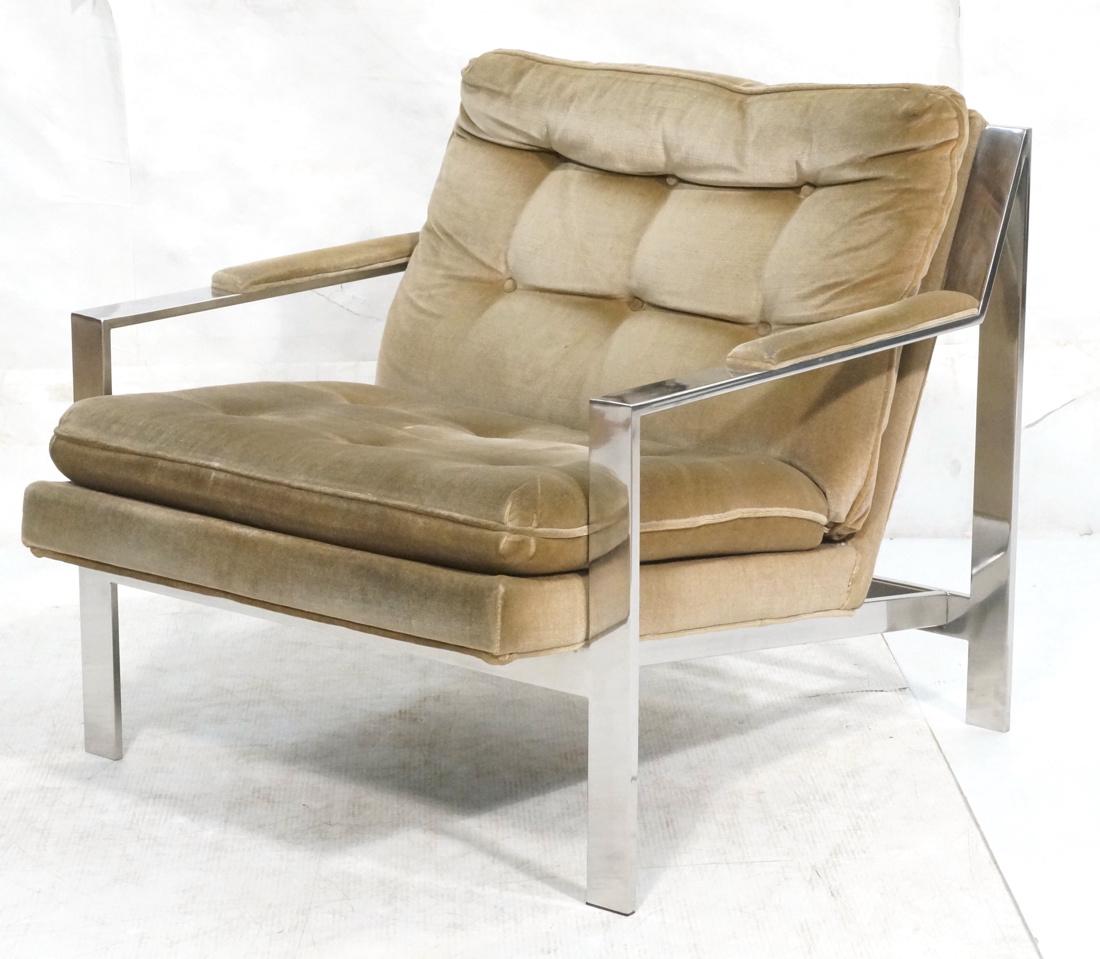 MILO BAUGHMAN Wide Chrome Frame Lounge Chair. Mod: MILO BAUGHMAN Wide Chrome Frame Lounge Chair. Modern angle form. Taupe velvet tufted upholstery. Not marked.-- Dimensions: H: 28 inches: W: 29.5 inches: D: 32.5 inches ---