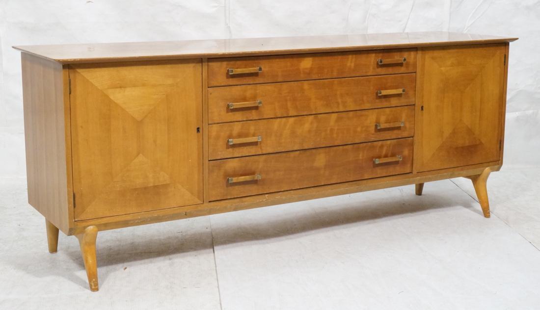 RENZO RUTILLI Blond Wood Credenza Sideboard. 4 ce: RENZO RUTILLI Blond Wood Credenza Sideboard. 4 center drawers with wood and gold tone pulls. 2 doors with triangle decorative inlay.-- Dimensions: H: 30.25 inches: W: 77 inches: D: 20 inches ---